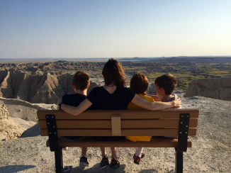 Aleta and the boys taking in the view in the Badlands National Park, Conata, United States.